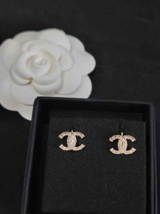 Chanel - Other - Gold-tone metal with clear rhinestone embellishments - Gold