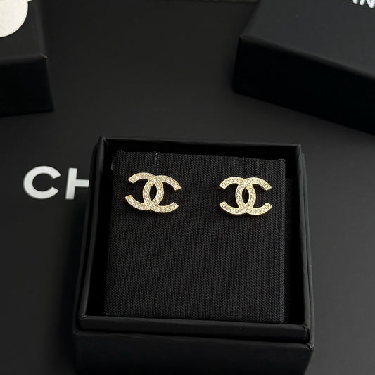 Chanel - Other - Gold-tone metal with clear rhinestone embellishments - Gold