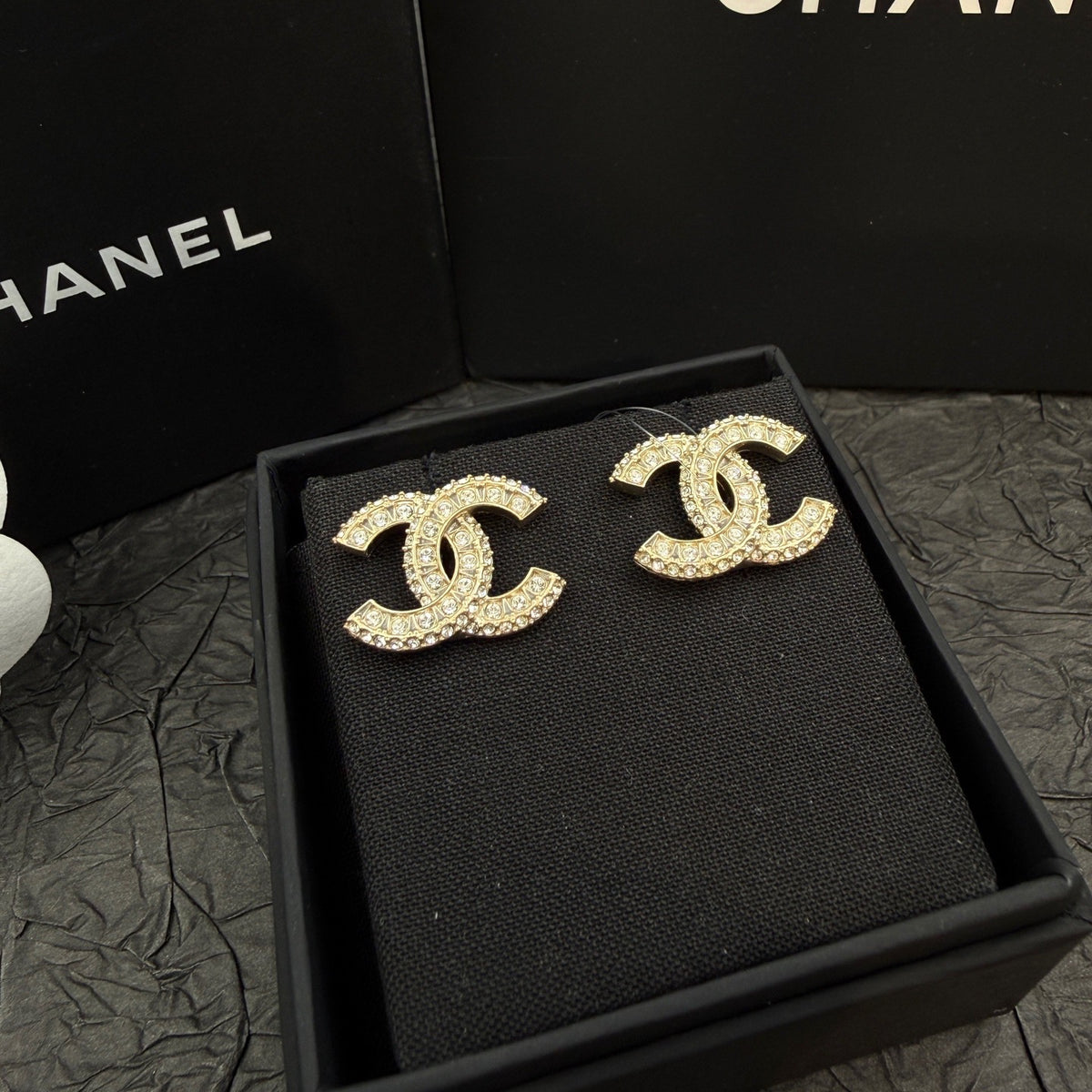 Chanel - Other - Gold-tone metal with clear rhinestone embellishments - Gold