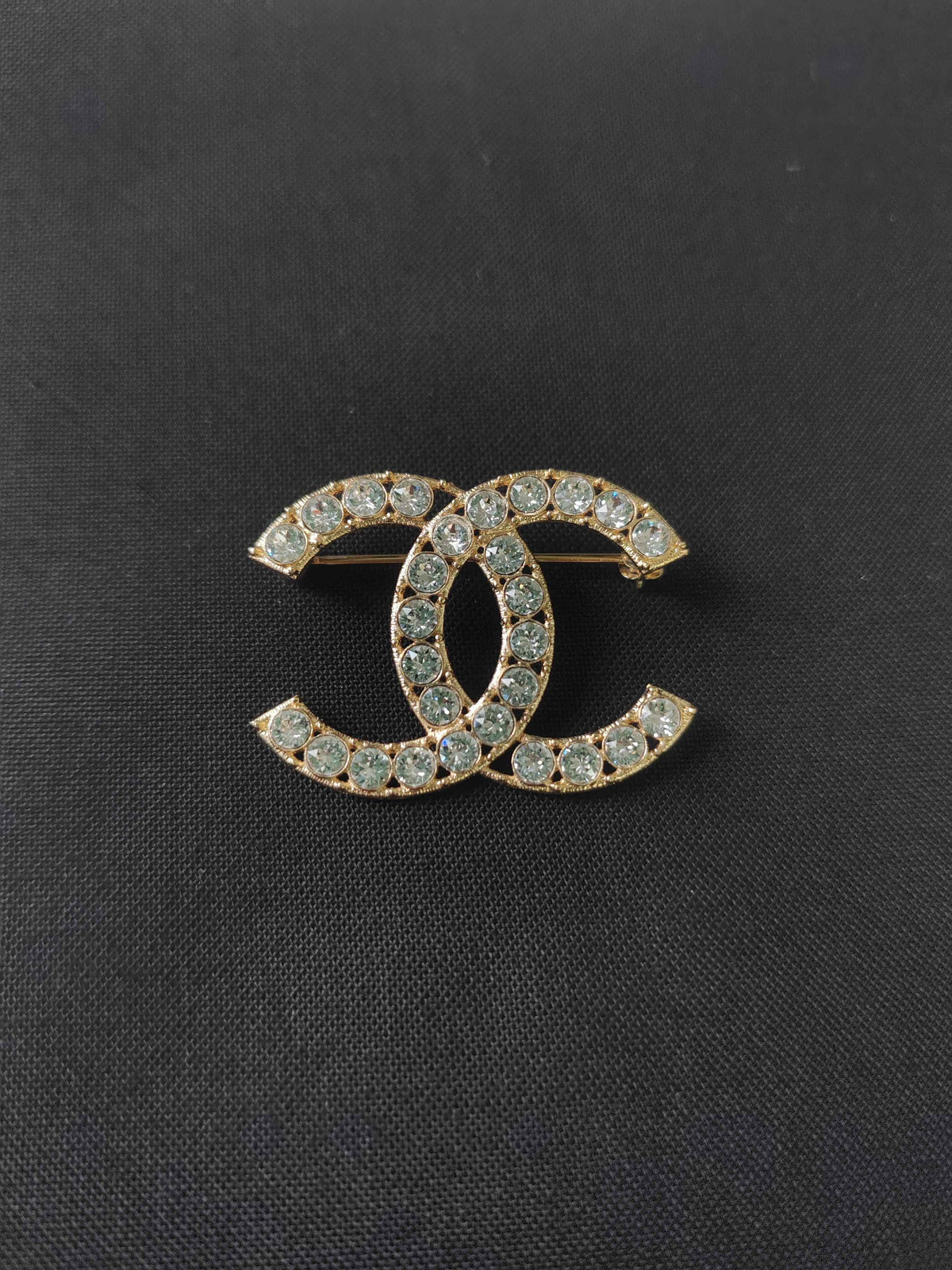 Chanel - Other - Gold-tone metal with clear rhinestone stones - Gold