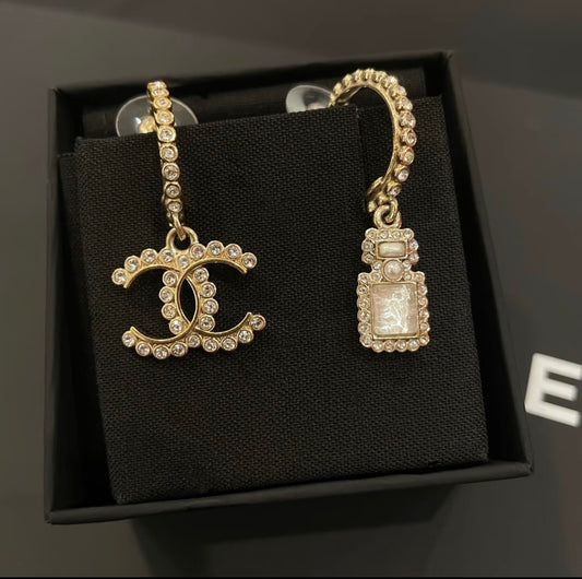 Chanel - Other - Gold-tone metal with clear rhinestones and pearl-like and iridescent accents; exact stone composition is unknown. - Gold