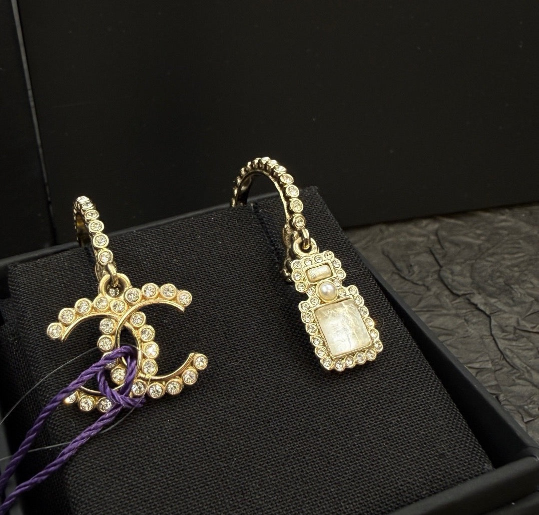 Chanel - Other - Gold-tone metal with clear rhinestones and pearl-like and iridescent accents; exact stone composition is unknown. - Gold