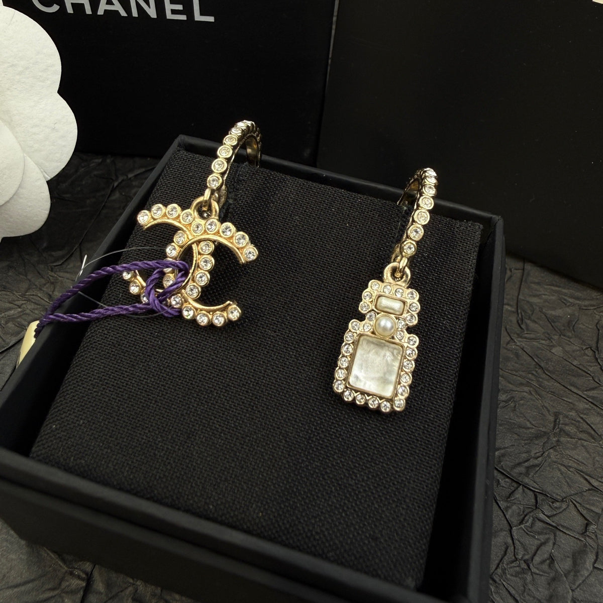 Chanel - Other - Gold-tone metal with clear rhinestones and pearl-like and iridescent accents; exact stone composition is unknown. - Gold