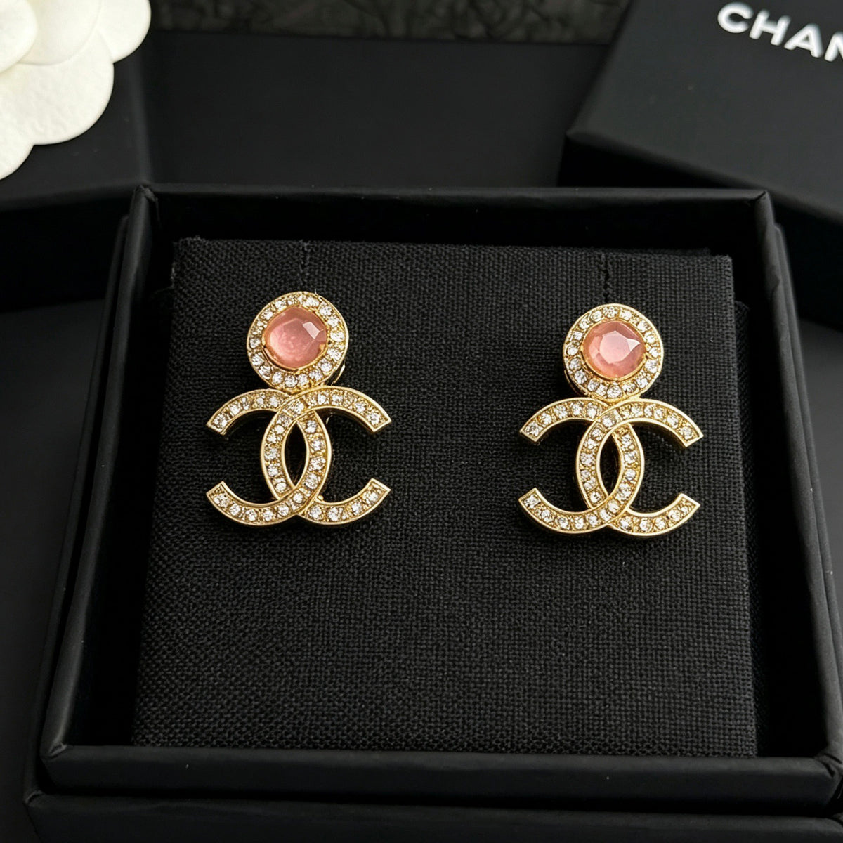 Chanel - Other - Gold-tone metal with clear rhinestones and pink cabochon accents; exact stone materials unknown. - Gold