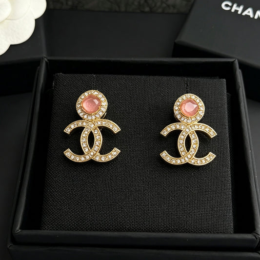 Chanel - Other - Gold-tone metal with clear rhinestones and pink cabochon accents; exact stone materials unknown. - Gold