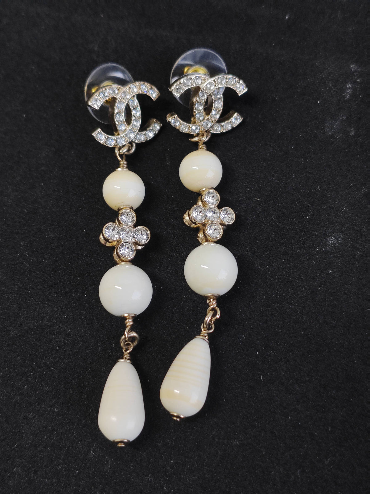 Chanel - Other - Gold-tone metal with clear rhinestones and white imitation pearl accents. - Gold