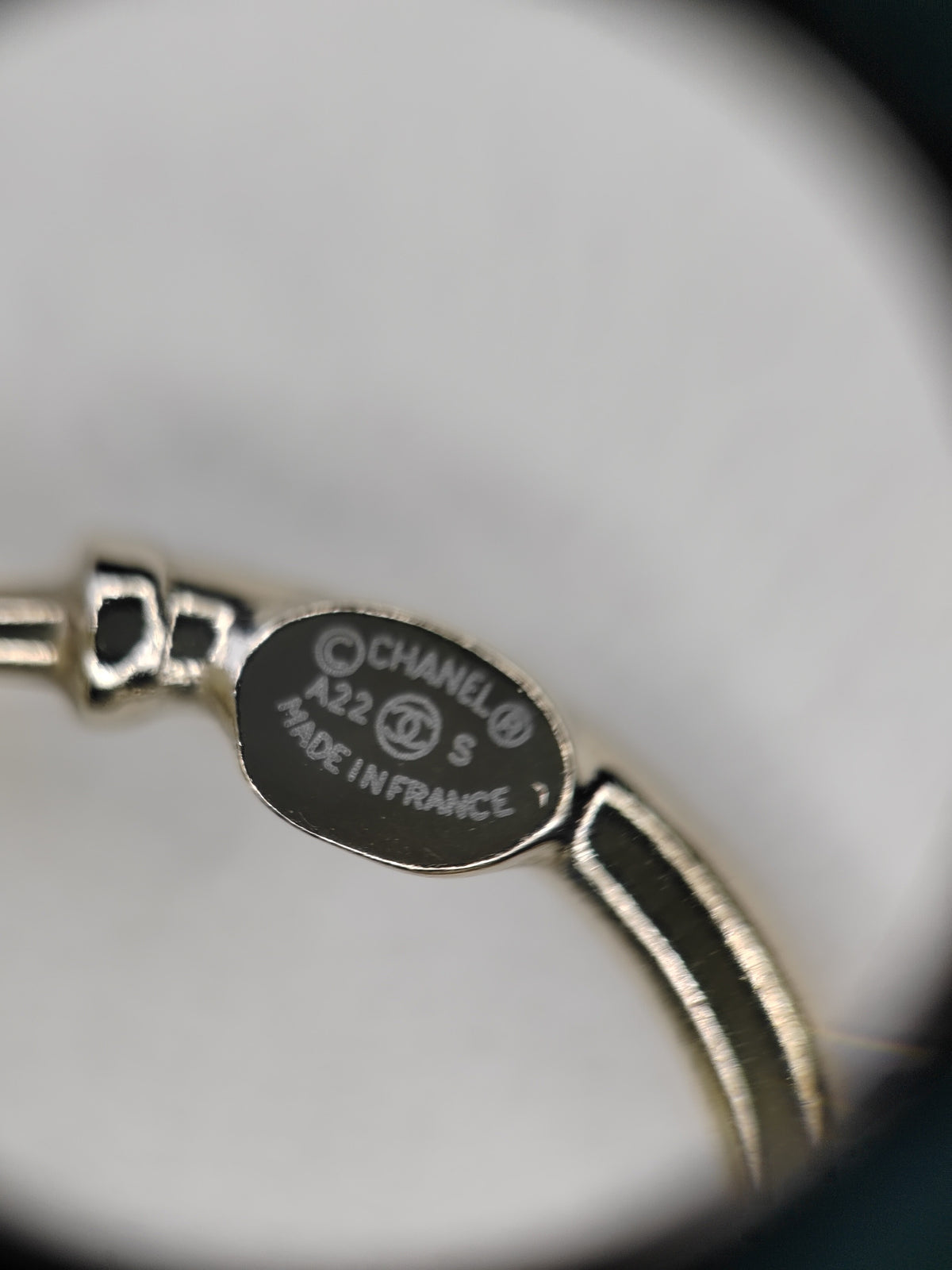 Chanel - Other - Gold-tone metal with crystal embellishments and white perfume-bottle charms. - White