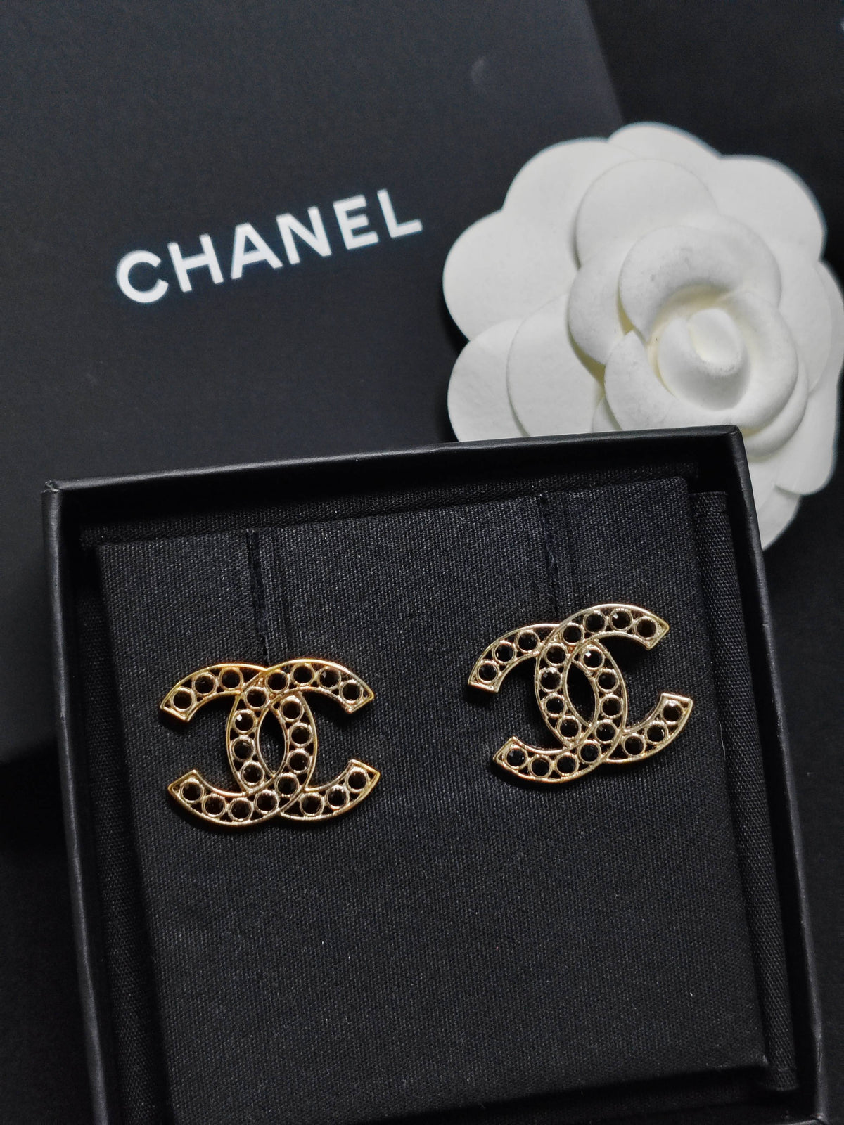 Chanel - Other - Gold-tone metal with dark stone accents; exact stone composition is unconfirmed. - Gold