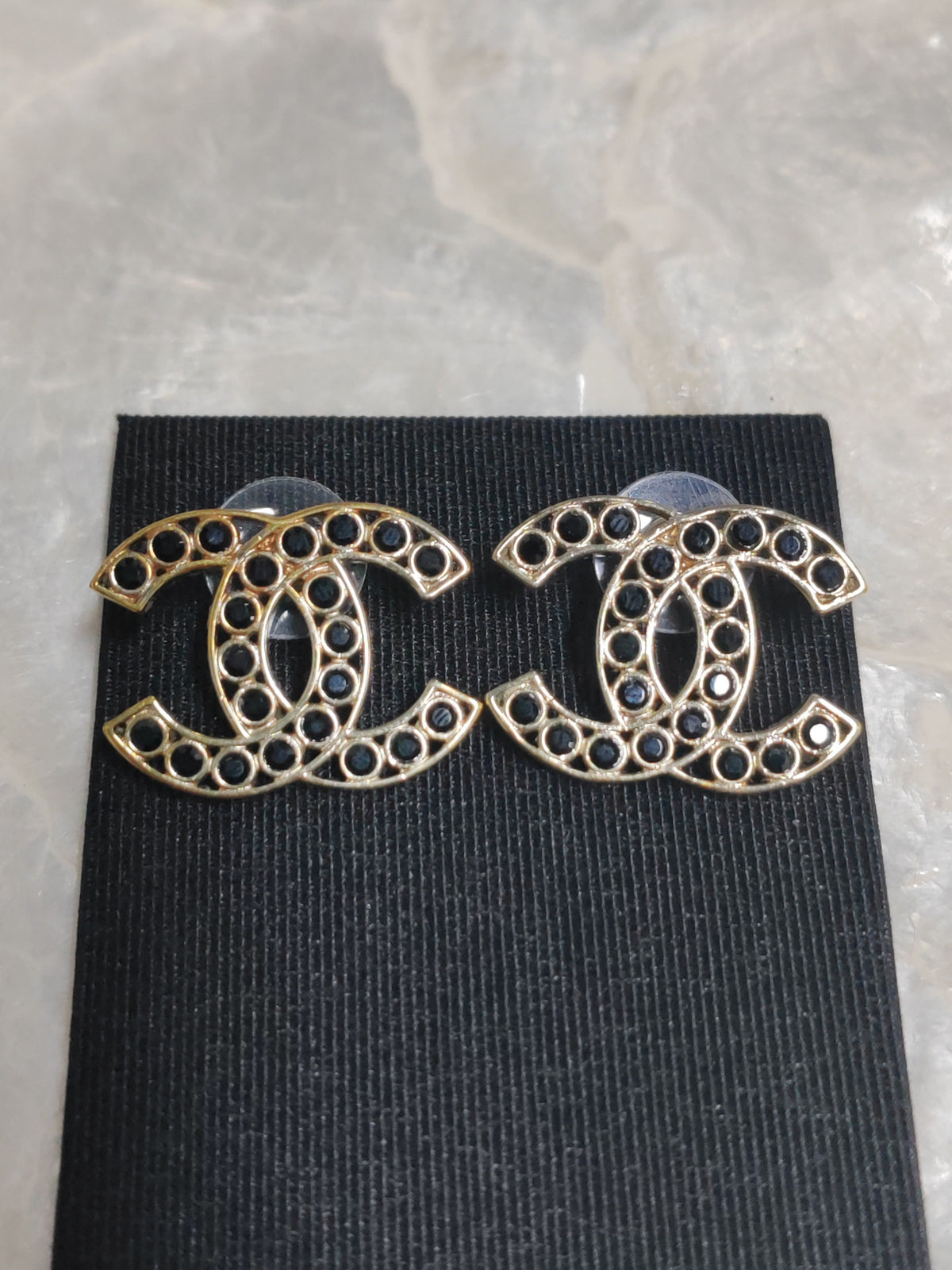 Chanel - Other - Gold-tone metal with dark stone accents; exact stone composition is unconfirmed. - Gold