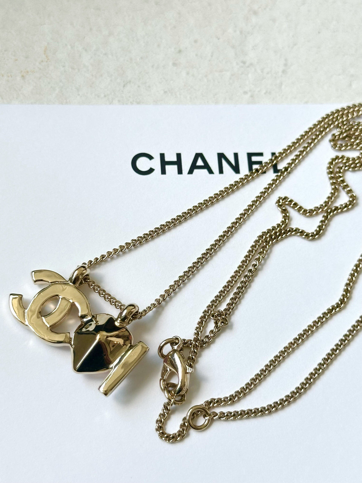 Chanel - Other - Gold-tone metal with faux pearl and glass or crystal accents. - Gold