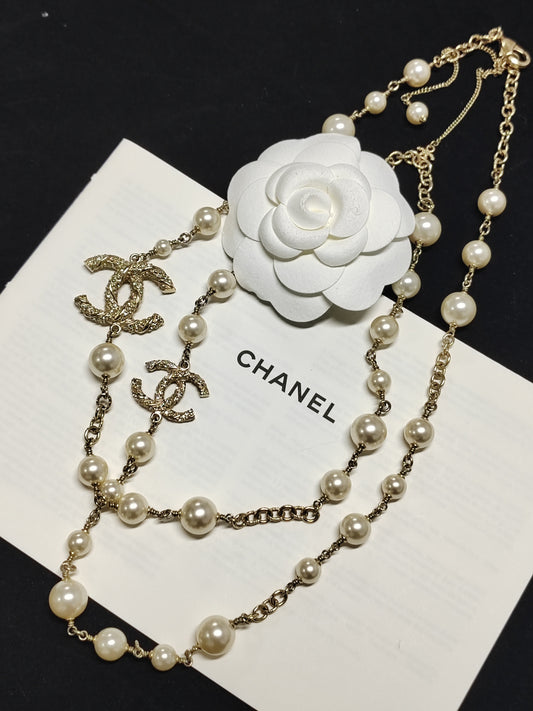 Chanel - Other - Gold-tone metal with faux pearl beads and clear crystal embellishments. - Gold