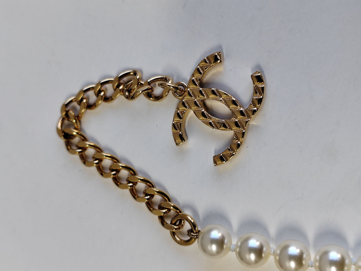 Chanel - Other - Gold-tone metal with faux pearl beads. - Multicolour