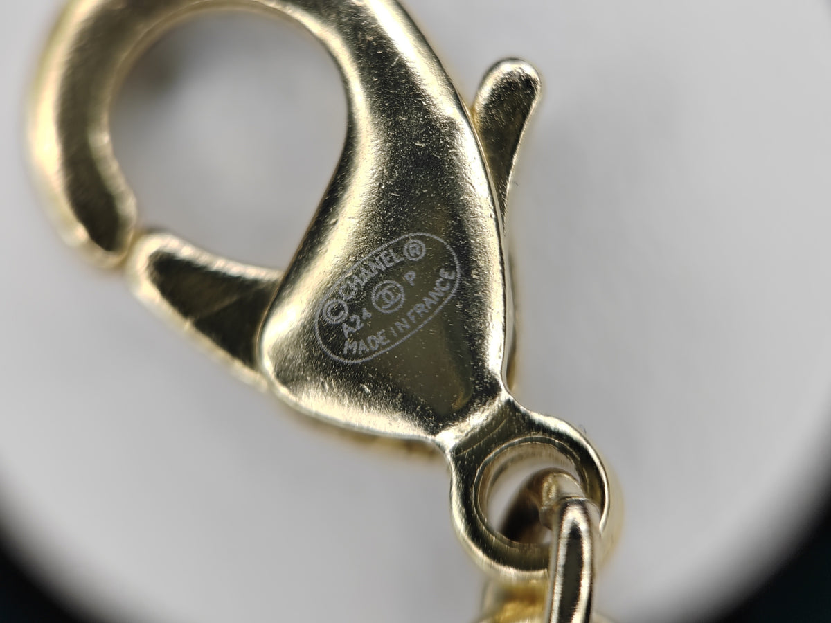 Chanel - Other - Gold-tone metal with faux pearl-style beads and enamel accents. - Multicolour
