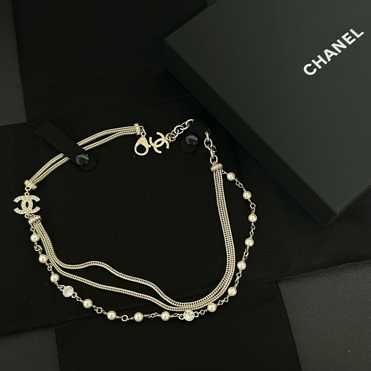 Chanel - Other - Gold-tone metal with faux pearls and clear rhinestone-style stones. - Gold