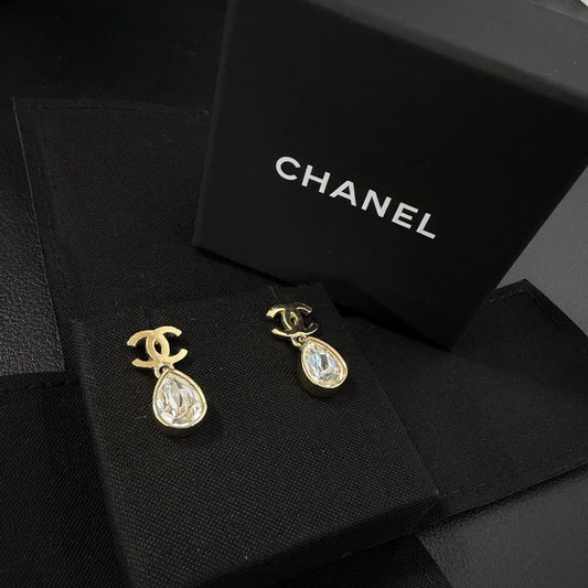 Chanel - Other - Gold-tone metal with glass crystal embellishments; exact alloy unspecified. - Gold