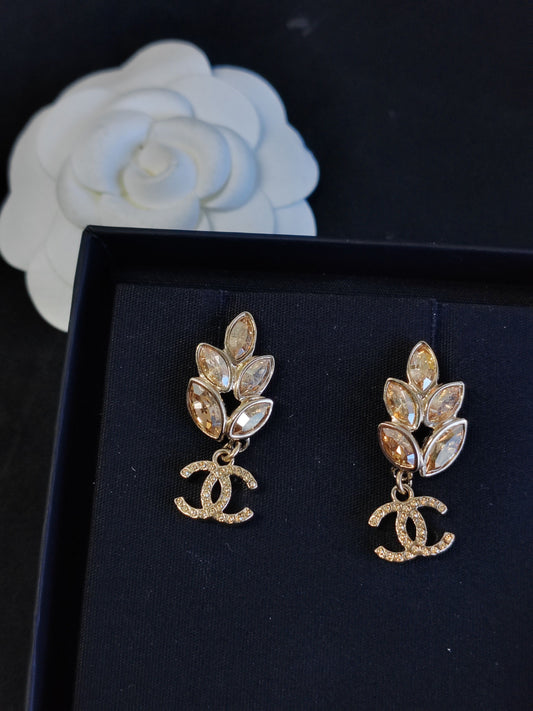 Chanel - Other - Gold-tone metal with glass crystal embellishments. - Gold