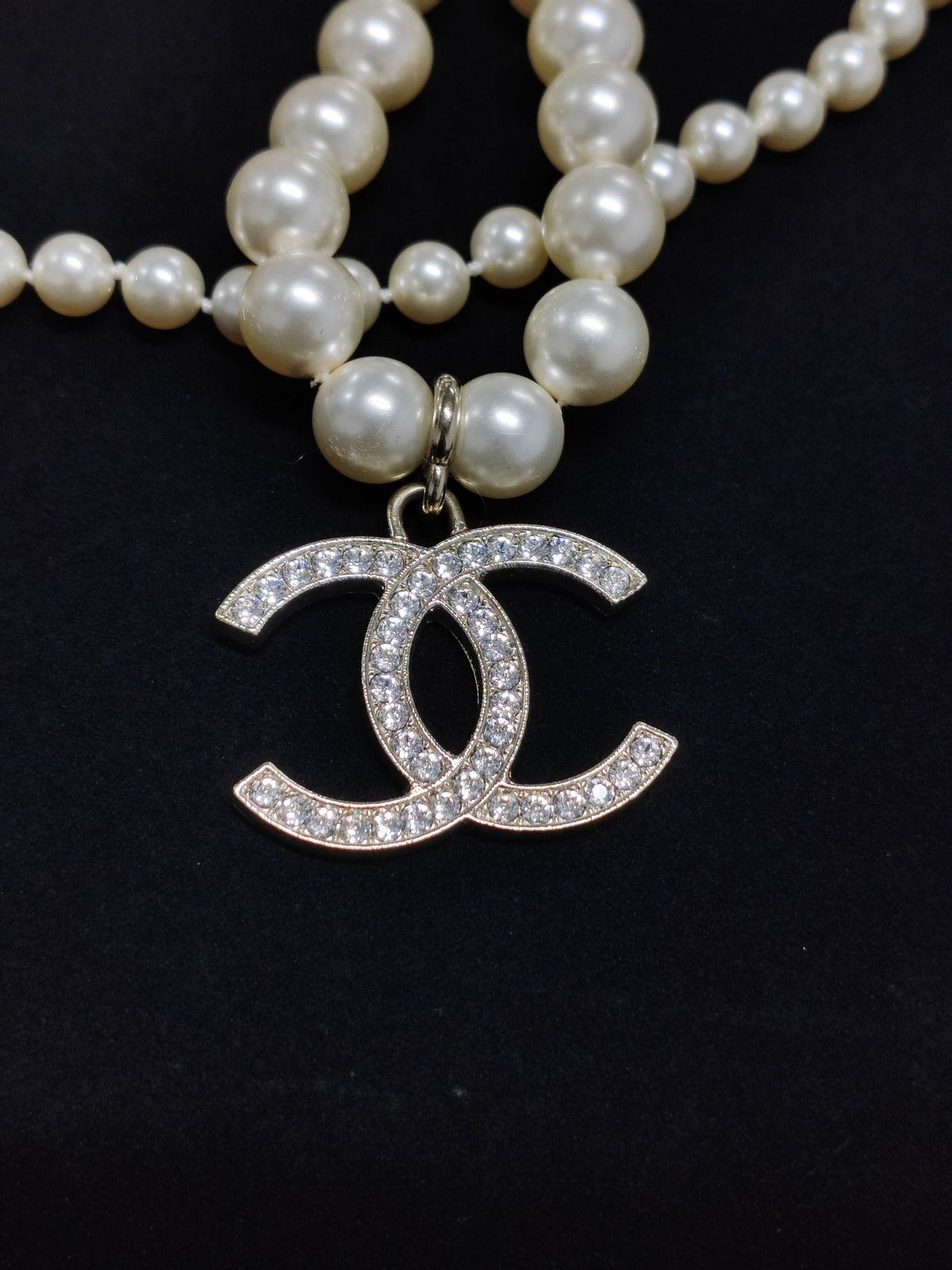 Chanel - Other - Gold-tone metal with glass crystals and imitation pearls - White