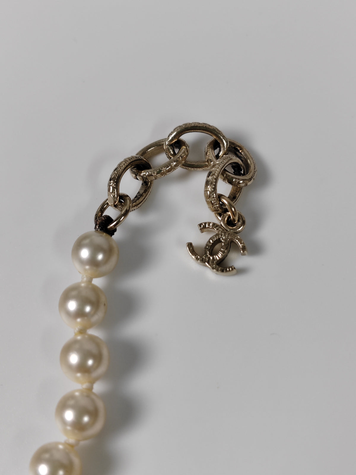 Chanel - Other - Gold-tone metal with glass faux pearls and rhinestone embellishments. - Multicolour