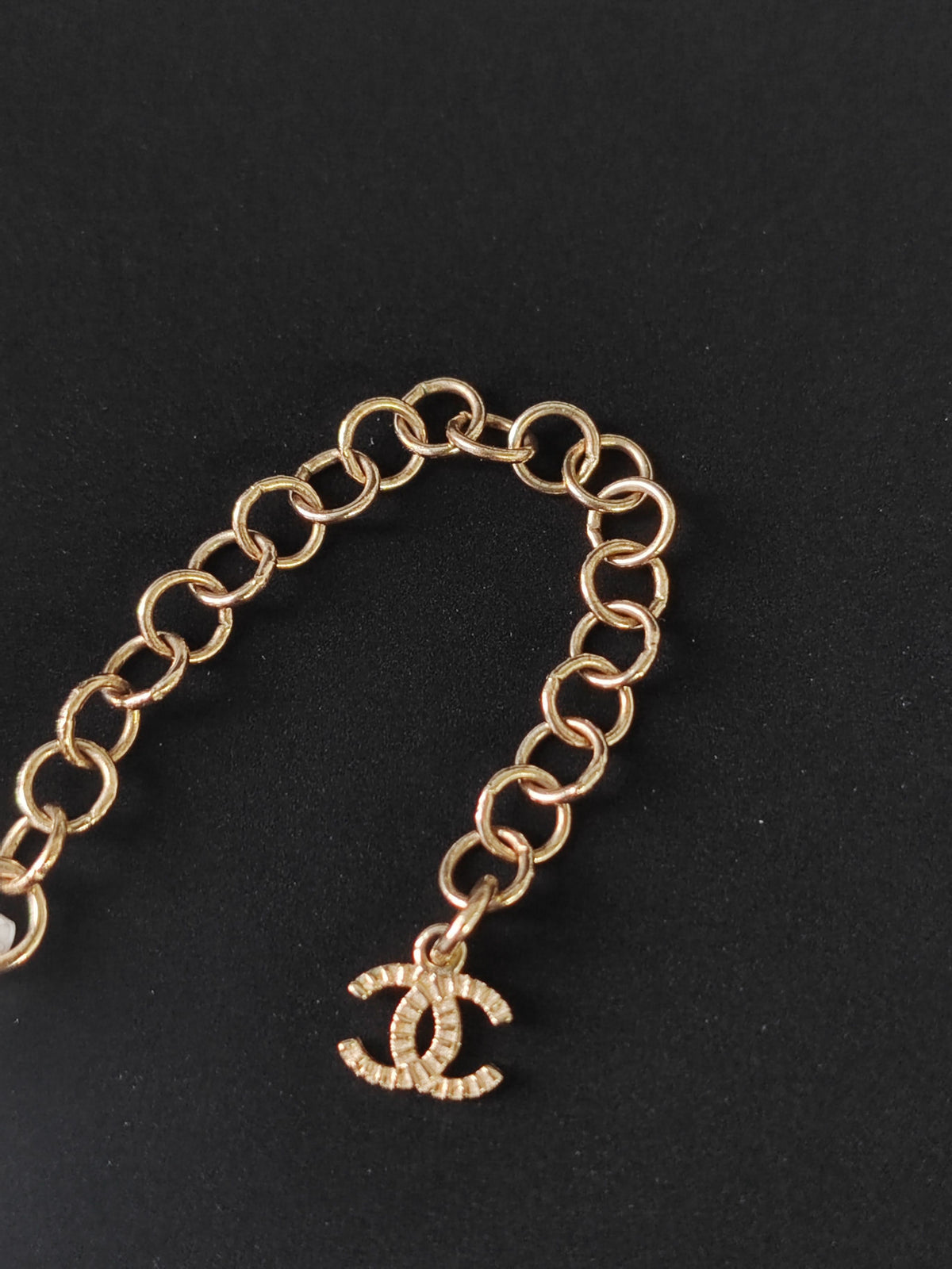 Chanel - Other - Gold-tone metal with glass rhinestone embellishments; exact composition unverified. - Gold
