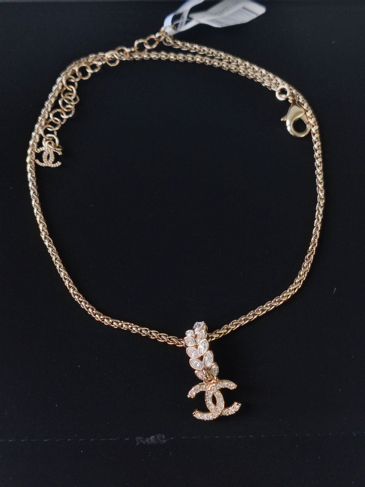 Chanel - Other - Gold-tone metal with glass rhinestone embellishments; exact composition unverified. - Gold