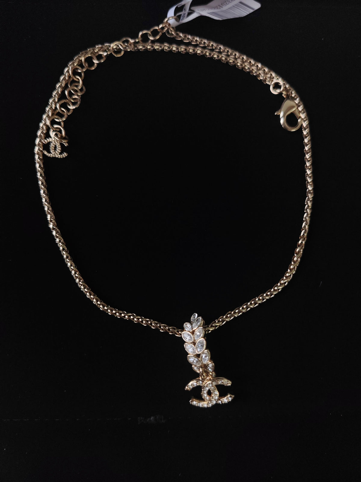 Chanel - Other - Gold-tone metal with glass rhinestone embellishments; exact composition unverified. - Gold
