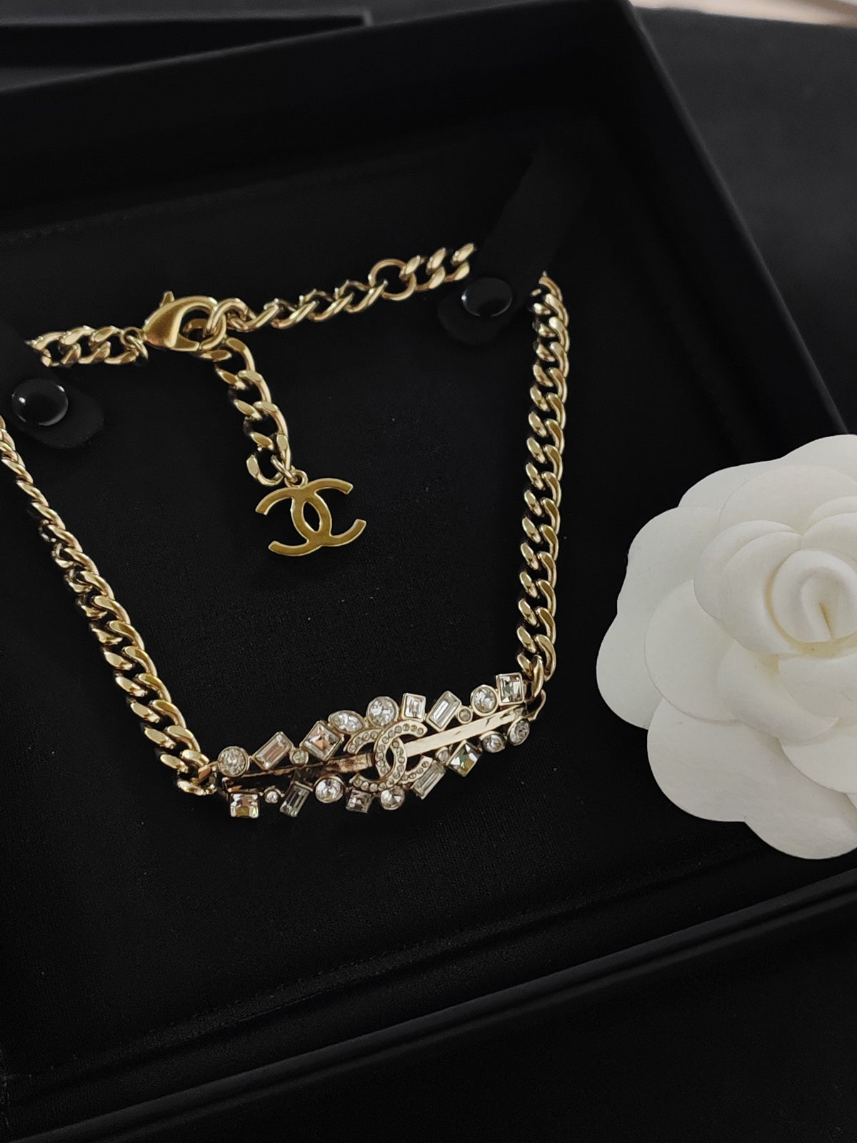 Chanel - Other - Gold-tone metal with glass rhinestone embellishments - Gold