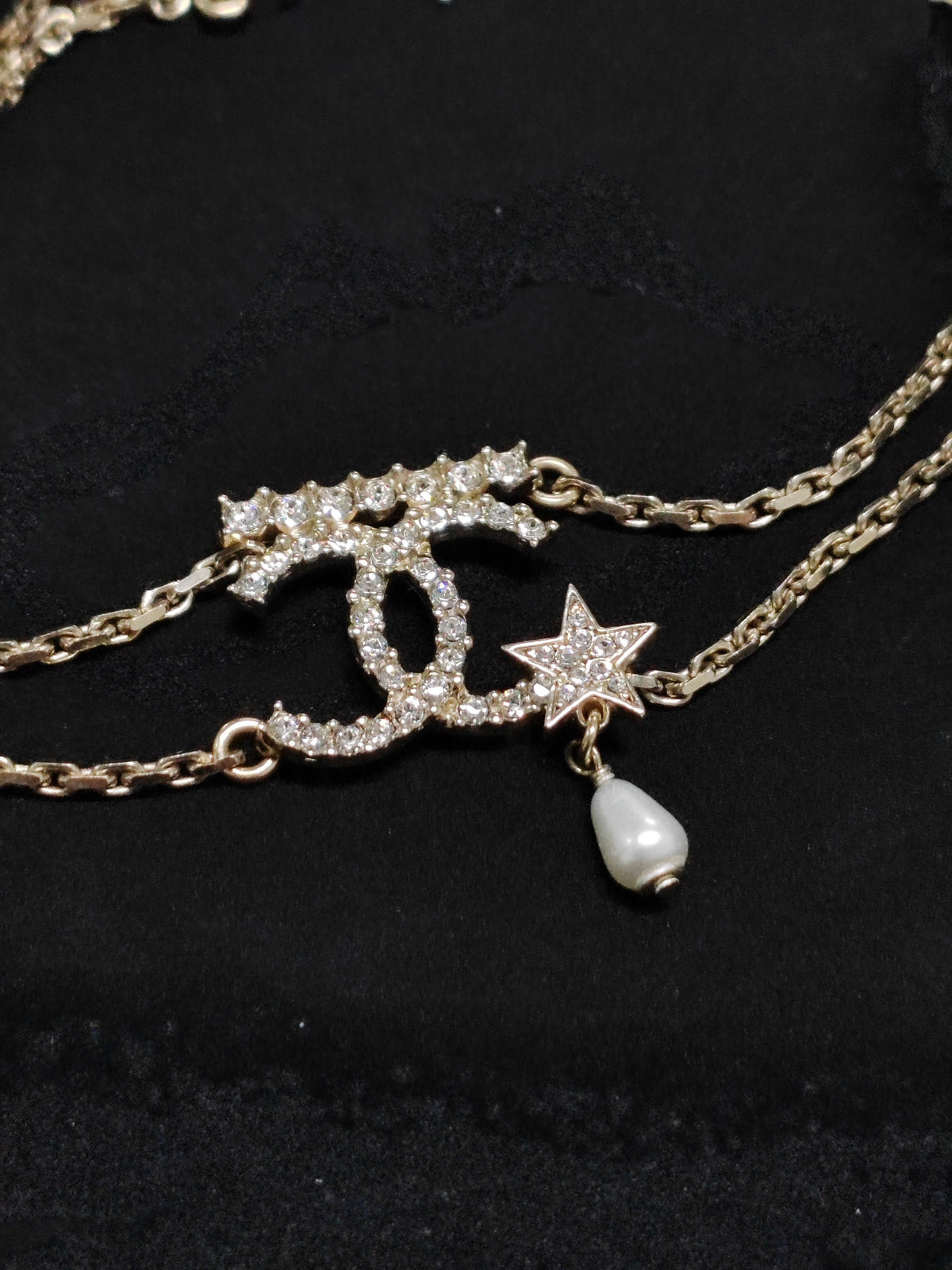 Chanel - Other - Gold-tone metal with glass rhinestones and a faux-pearl drop. - Gold
