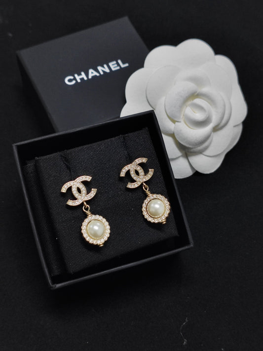 Chanel - Other - Gold-tone metal with glass rhinestones and faux pearl accents. - Gold