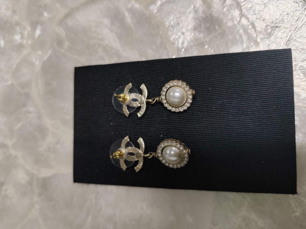 Chanel - Other - Gold-tone metal with glass rhinestones and faux pearl accents. - Gold