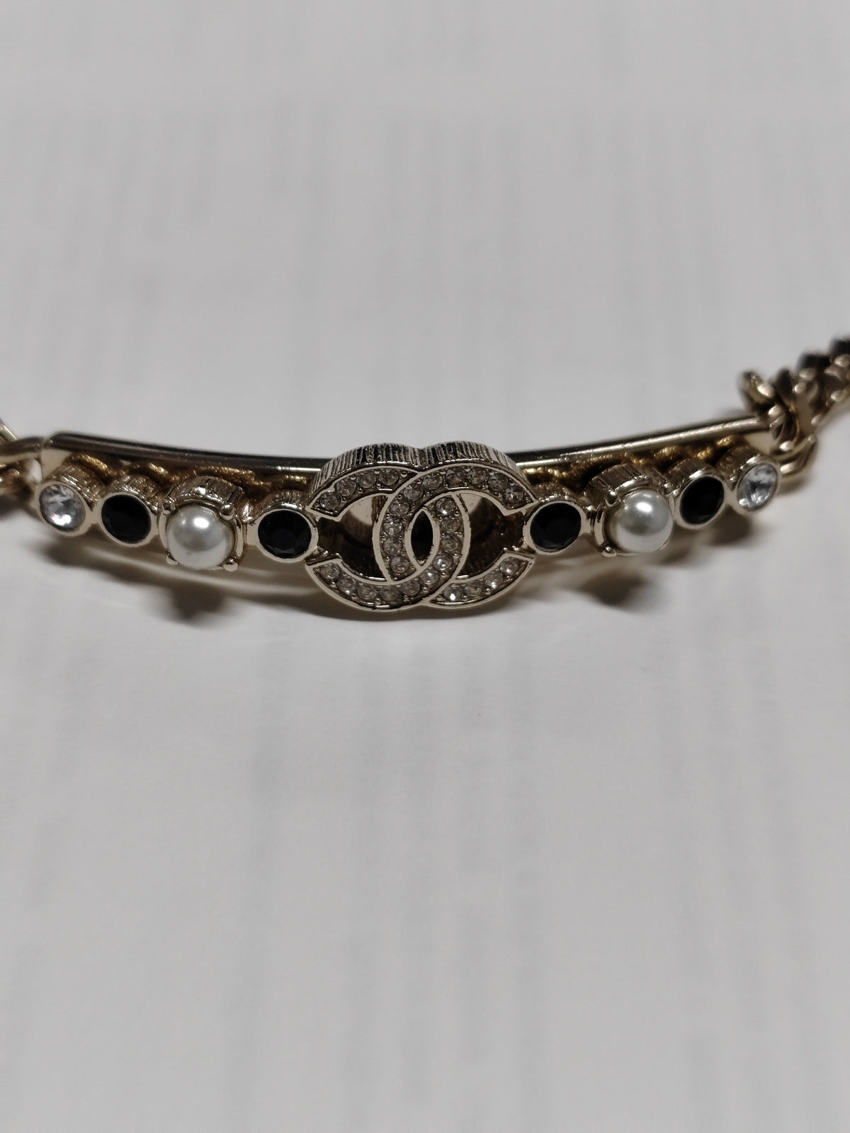 Chanel - Other - Gold-tone metal with glass rhinestones and imitation pearls. - Multicolour