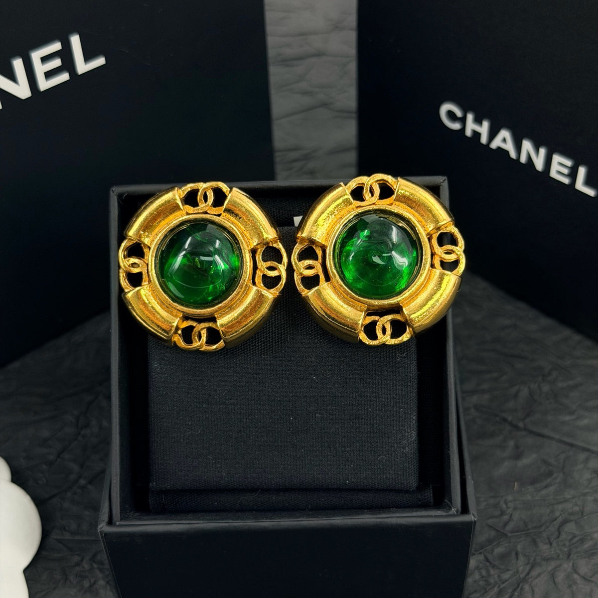 Chanel - Other - Gold-tone metal with green glass cabochons. - Multicolour