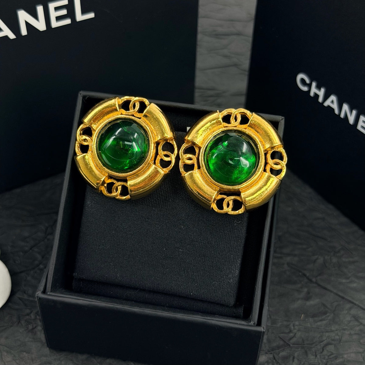 Chanel - Other - Gold-tone metal with green glass cabochons. - Multicolour