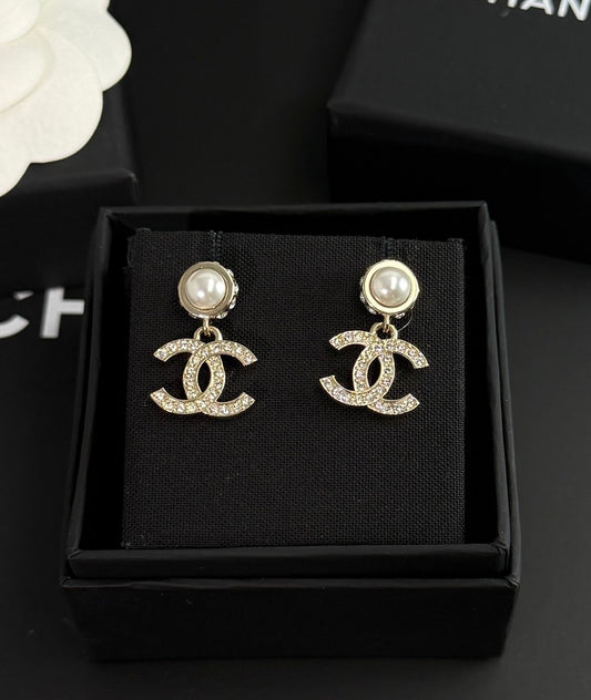 Chanel - Other - Gold-tone metal with imitation pearl and rhinestone accents. - Gold
