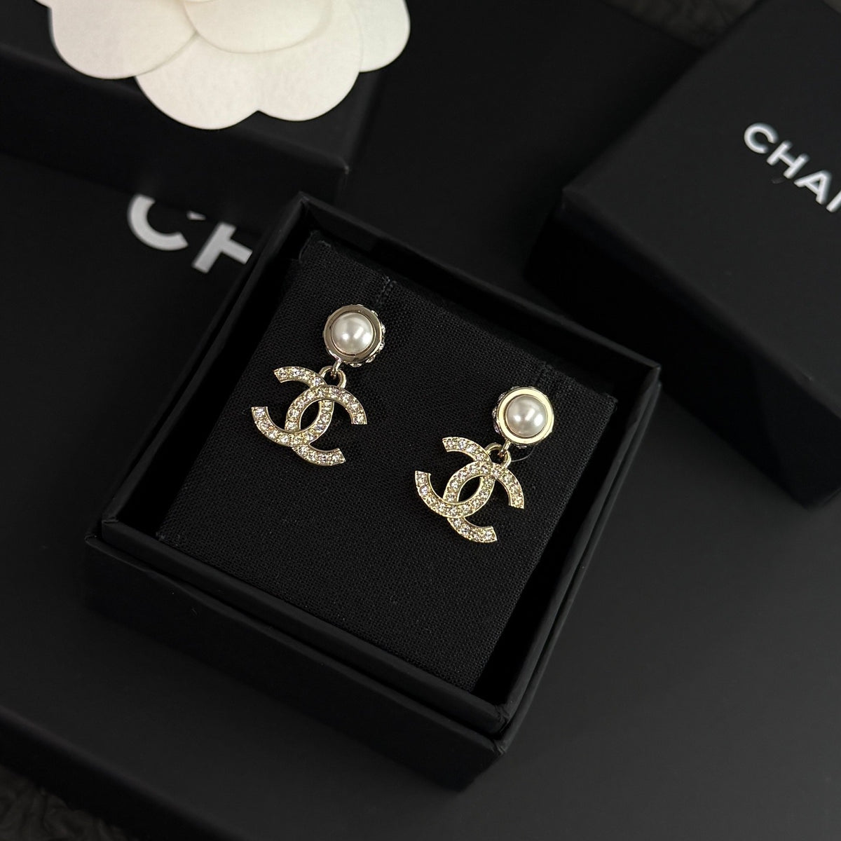 Chanel - Other - Gold-tone metal with imitation pearl and rhinestone accents. - Gold