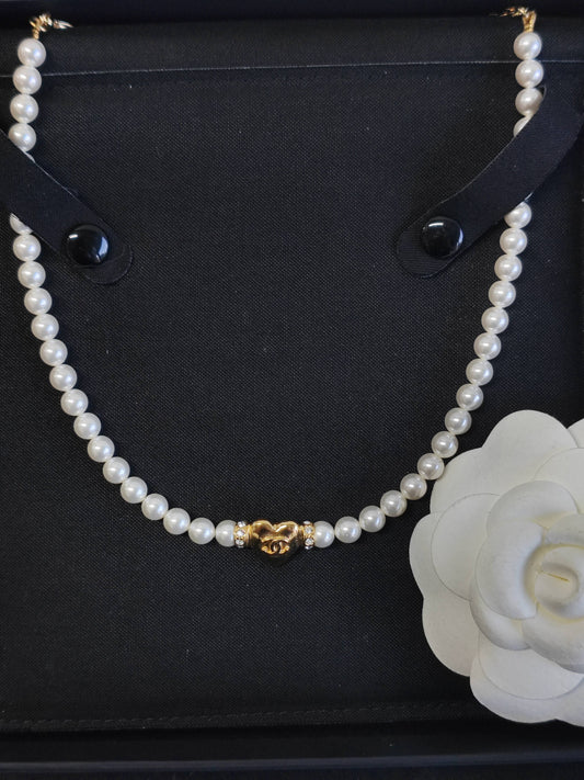 Chanel - Other - Gold-tone metal with imitation pearl beads and clear rhinestone accents. - White