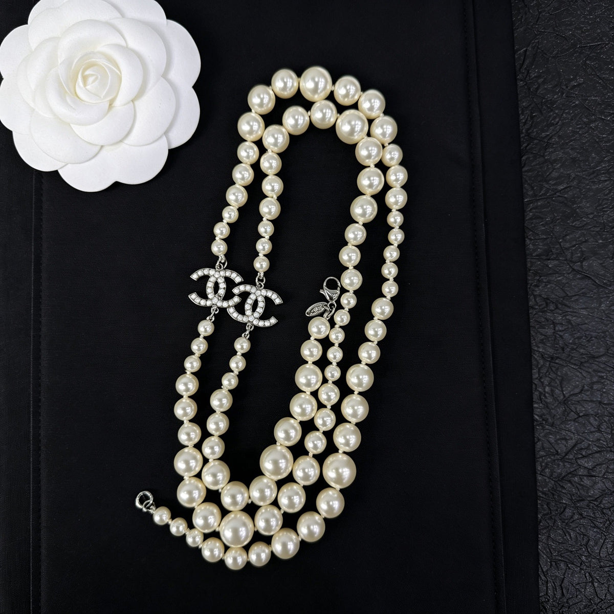 Chanel - Other - Gold-tone metal with imitation pearl beads and crystal-set double-C motifs - White