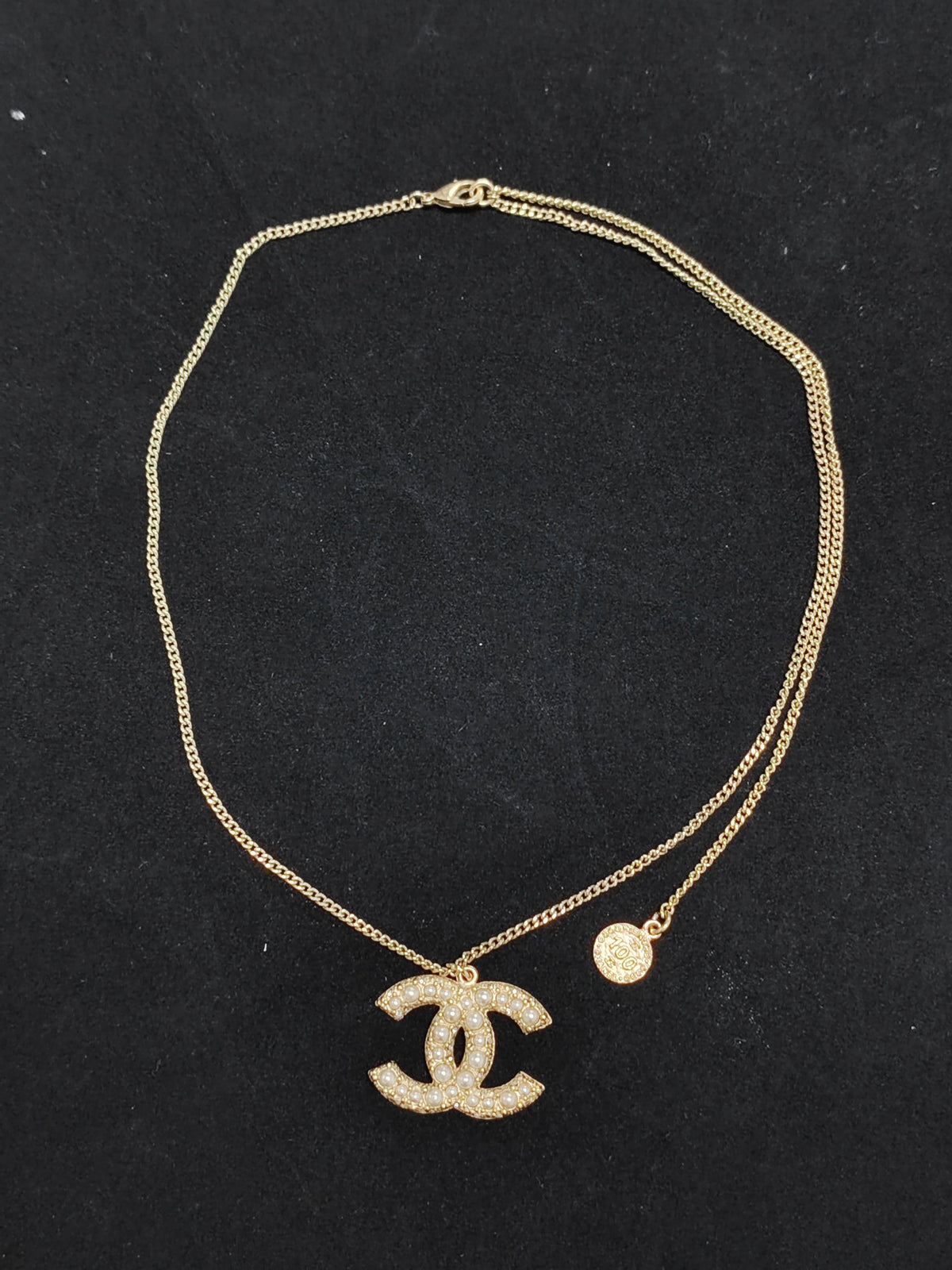 Chanel - Other - Gold-tone metal with imitation pearl embellishments. - Gold
