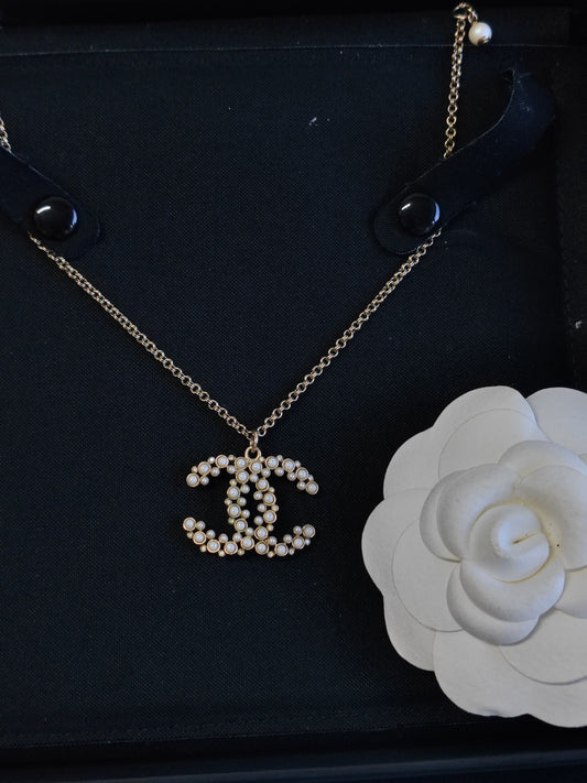 Chanel - Other - Gold-tone metal with imitation pearls and crystal accents. - Gold