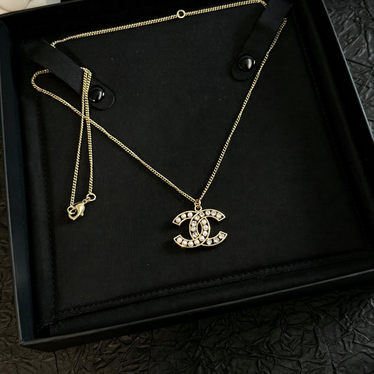 Chanel - Other - Gold-tone metal with imitation pearls and crystal embellishments. - Gold