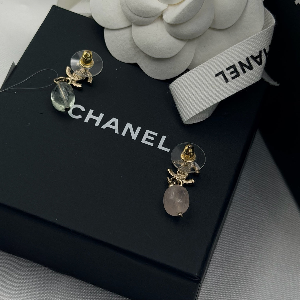 Chanel - Other - Gold-tone metal with multicolour rhinestones; the material of the dangling beads is unconfirmed. - Multicolour