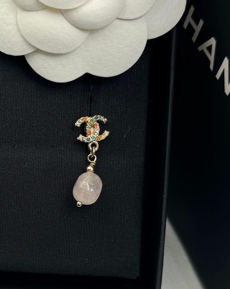 Chanel - Other - Gold-tone metal with multicolour rhinestones; the material of the dangling beads is unconfirmed. - Multicolour