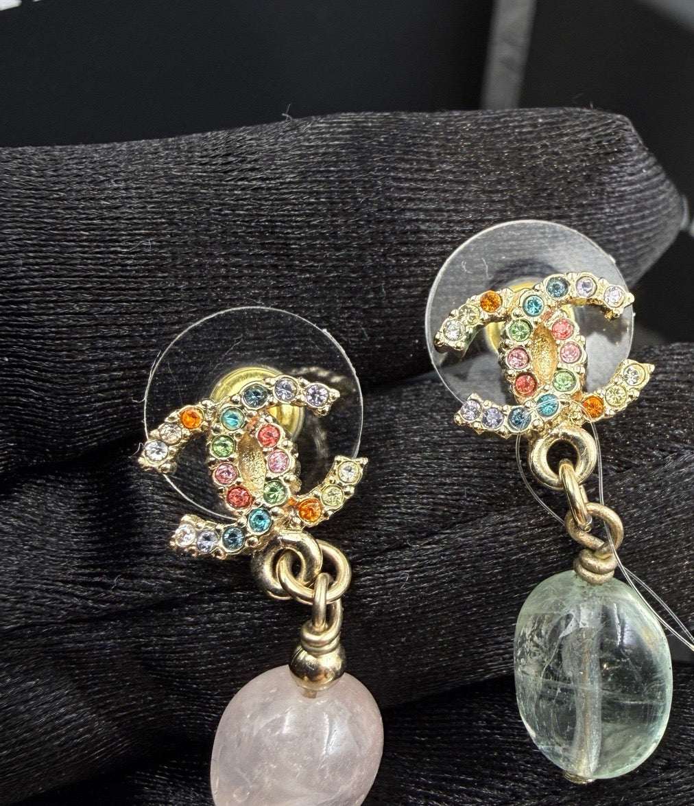 Chanel - Other - Gold-tone metal with multicolour rhinestones; the material of the dangling beads is unconfirmed. - Multicolour