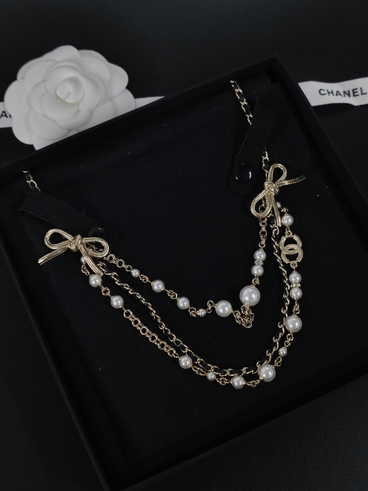 Chanel - Other - Gold-tone metal with pearl accents and black leather. - Multicolour