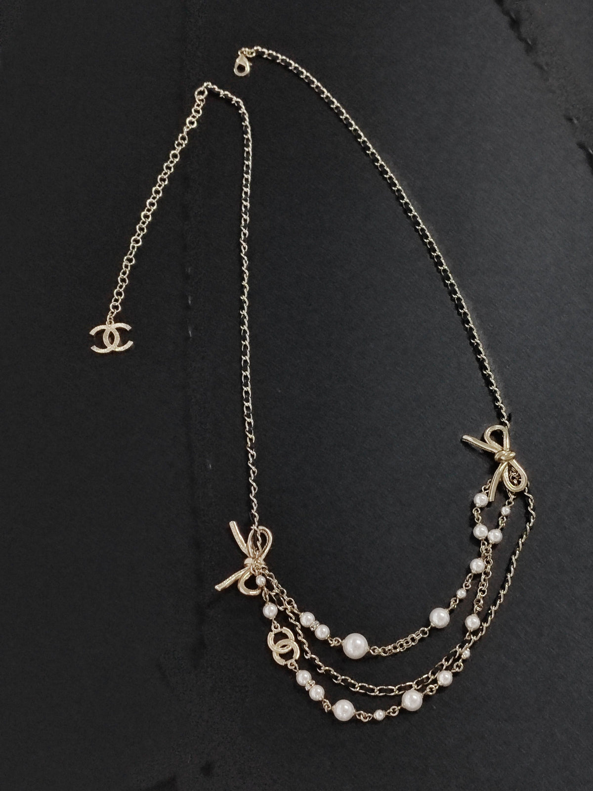 Chanel - Other - Gold-tone metal with pearl accents and black leather. - Multicolour