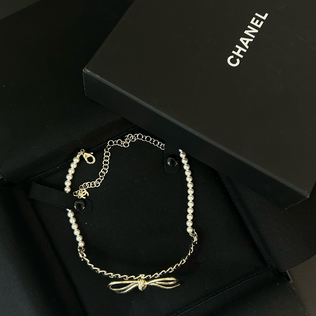 Chanel - Other - Gold-tone metal with pearl accents and lambskin leather. - Multicolour