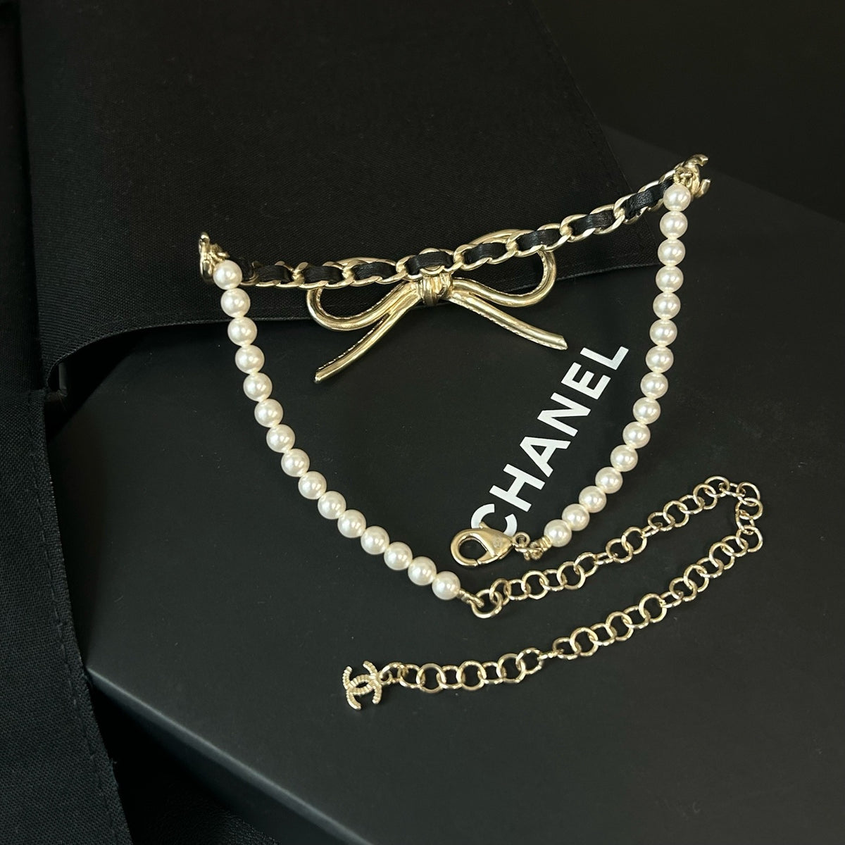 Chanel - Other - Gold-tone metal with pearl accents and lambskin leather. - Multicolour
