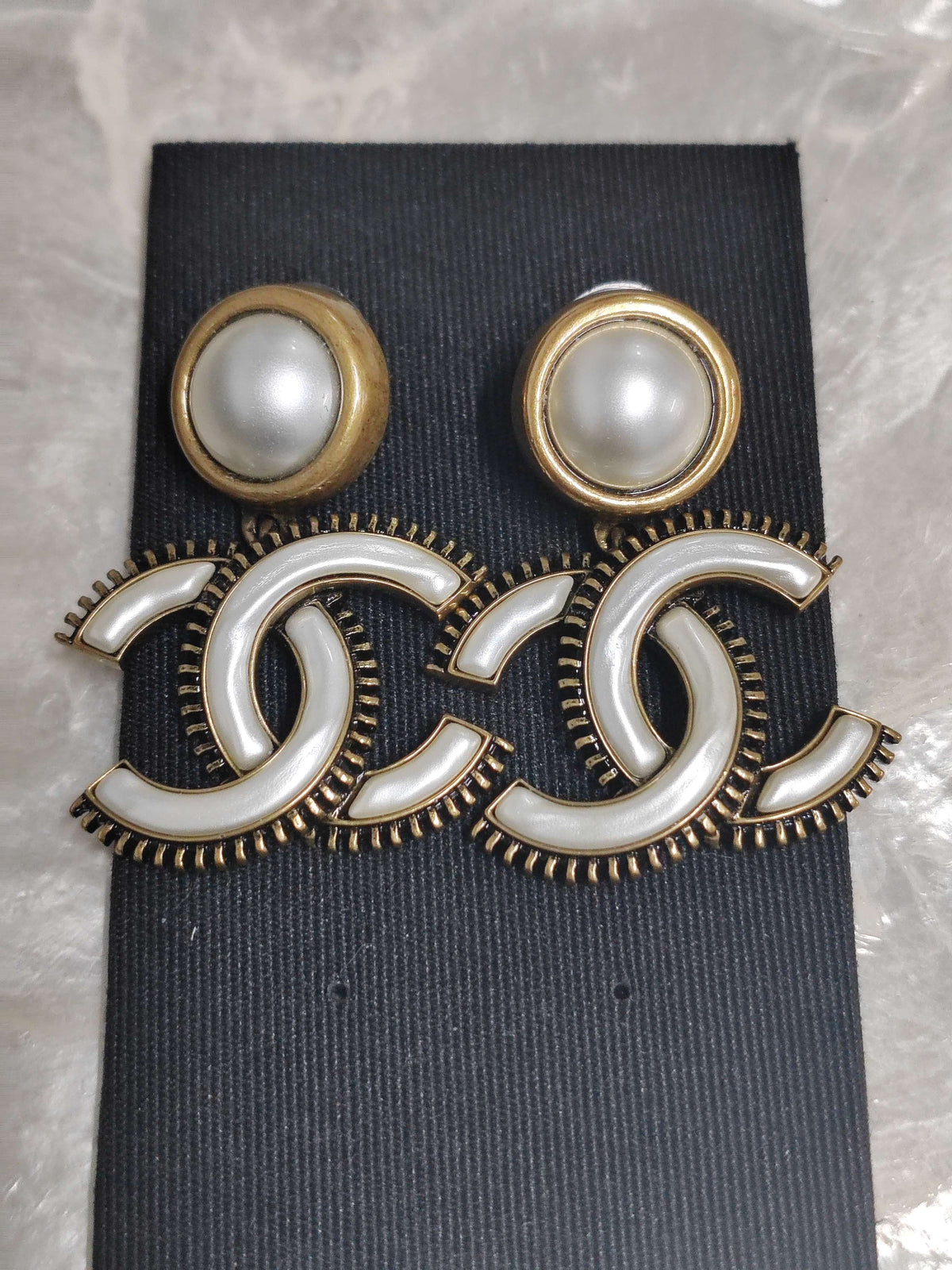 Chanel - Other - Gold-tone metal with pearl-effect and white enamel accents; exact metal composition unspecified. - Multicolour