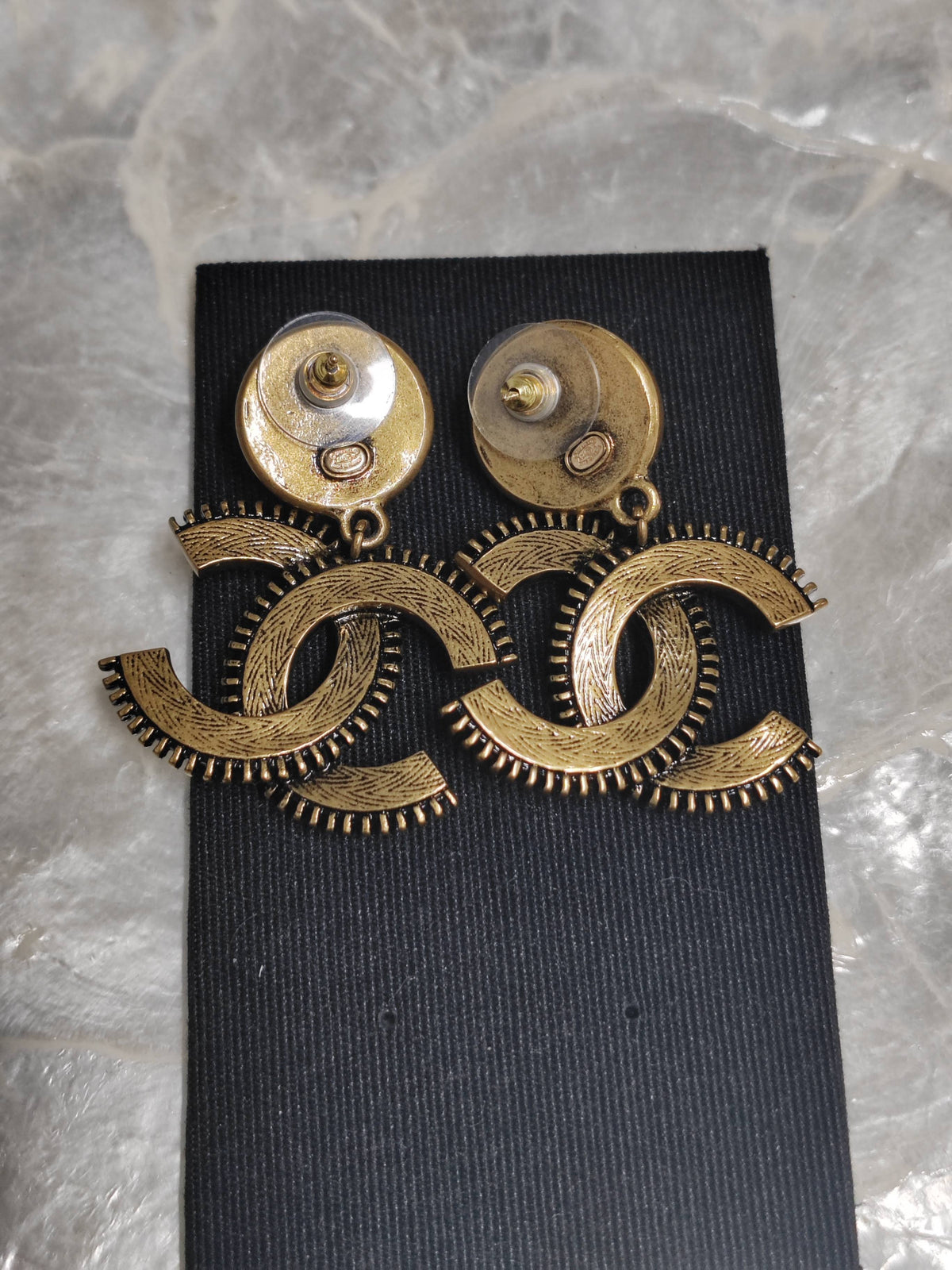 Chanel - Other - Gold-tone metal with pearl-effect and white enamel accents; exact metal composition unspecified. - Multicolour