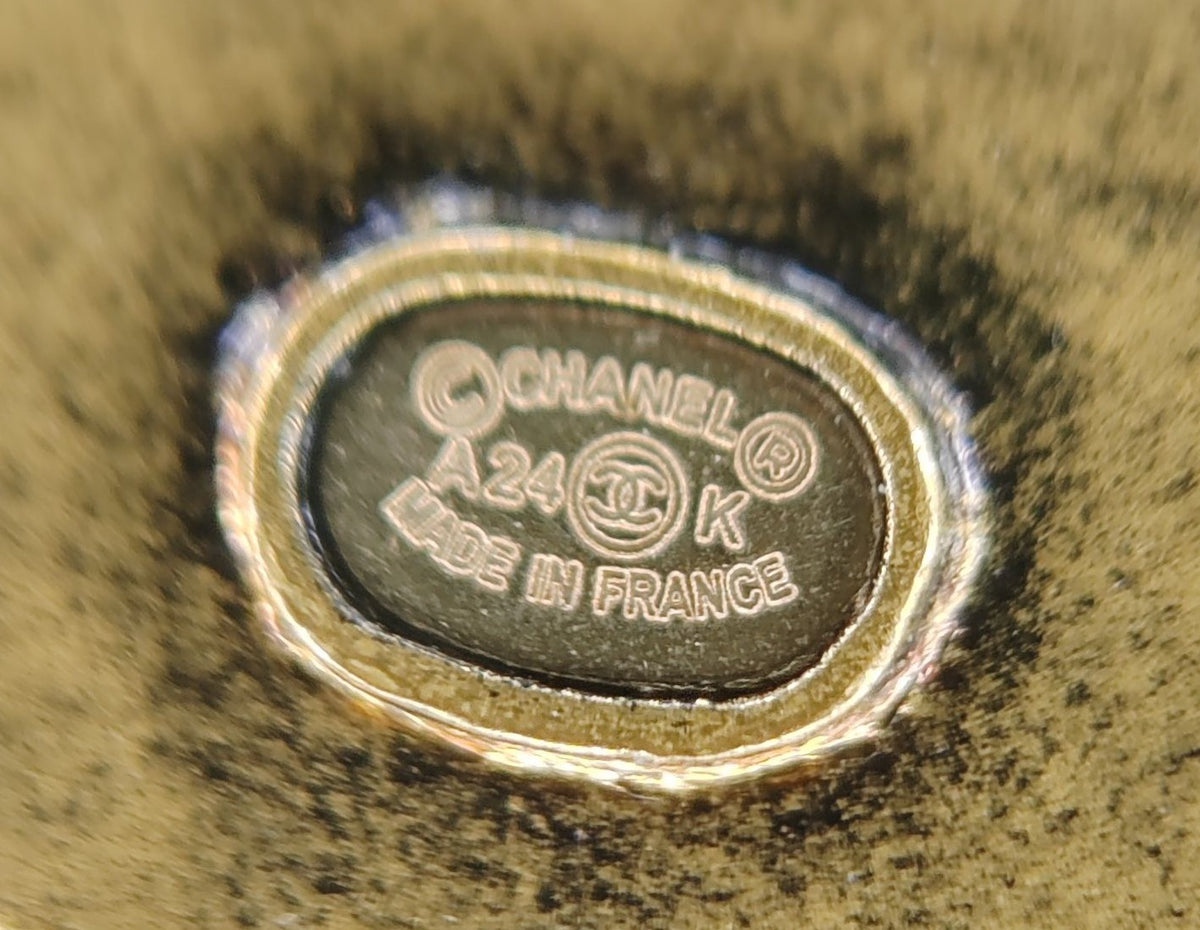 Chanel - Other - Gold-tone metal with pearl-effect and white enamel accents; exact metal composition unspecified. - Multicolour