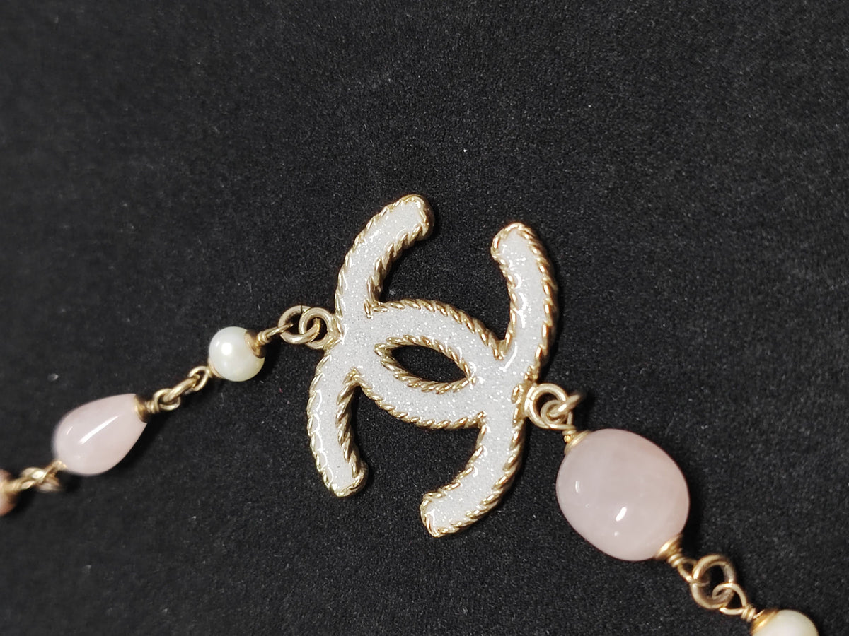 Chanel - Other - Gold-tone metal with pearl-like and pink beads. - Multicolour
